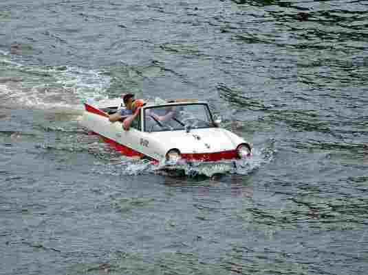 Picture of Amphicar which is a car / boat and goes on land in water Picture of Amphicar which is a car / boat and goes on land in water